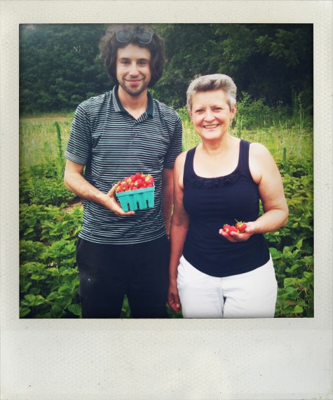 dan and mama picking strawberries